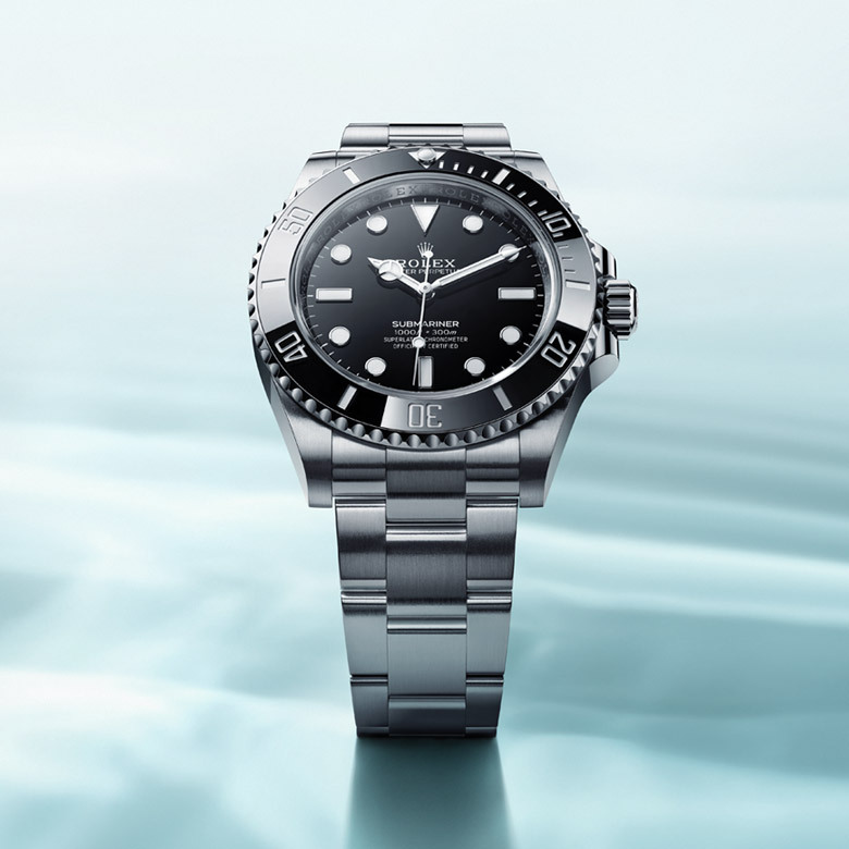 rolex collection banner submariner m124060 0001 0002 2210jva 001 portrait